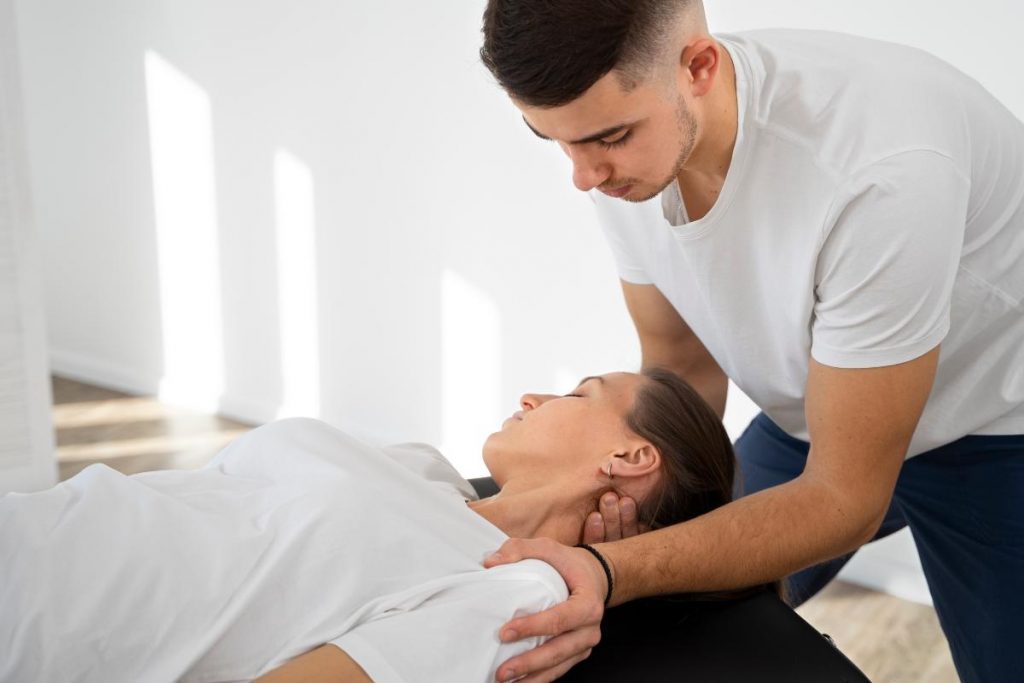 Practitioner using integrative manual therapy techniques