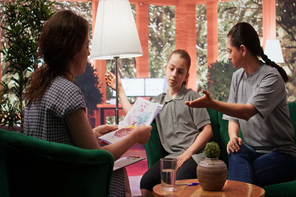 Therapist supporting client in psychedelic integration session.