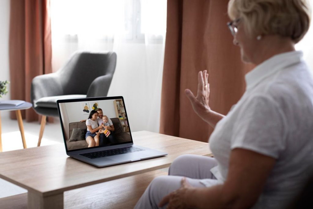Therapist providing care through virtual session.